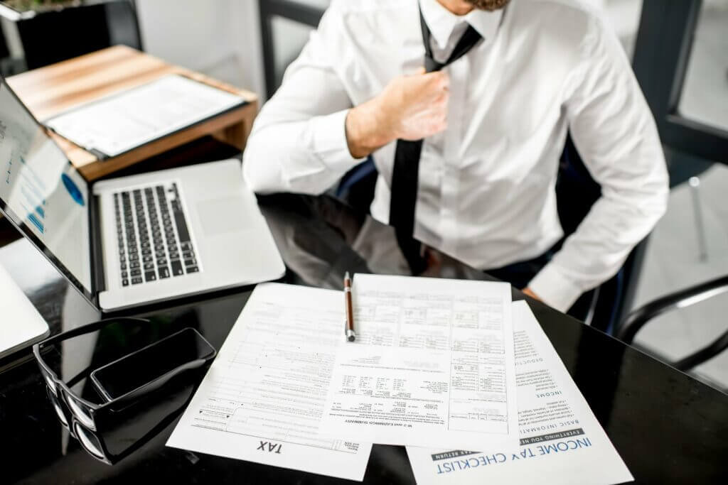 Businessman working with tax documents