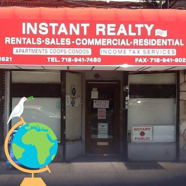 Instant Realty storefront with income tax services signage